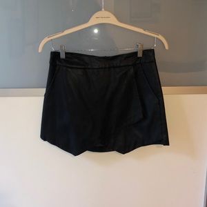 Black faux leather mini skirt